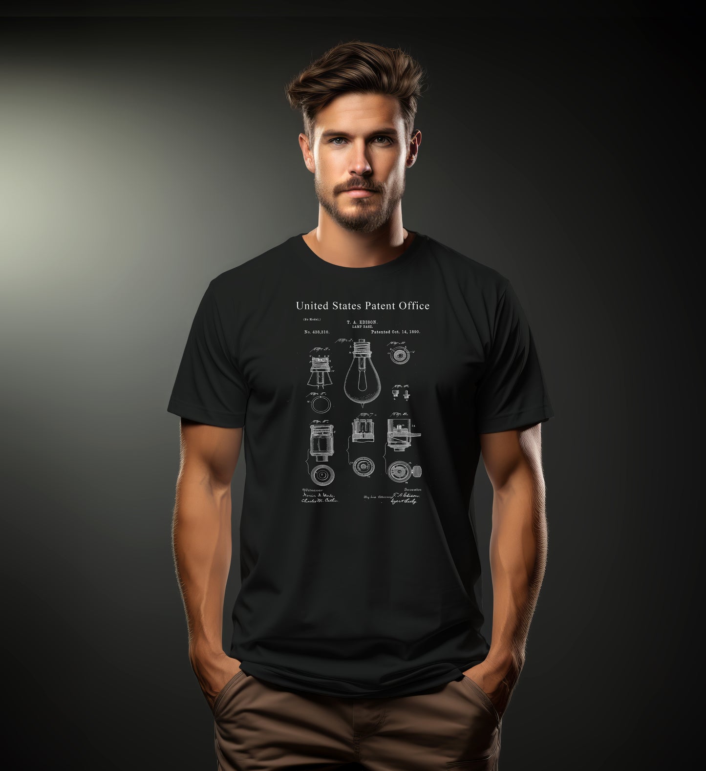 Man wearing a black t-shirt with a light bulb design and text on a dark background