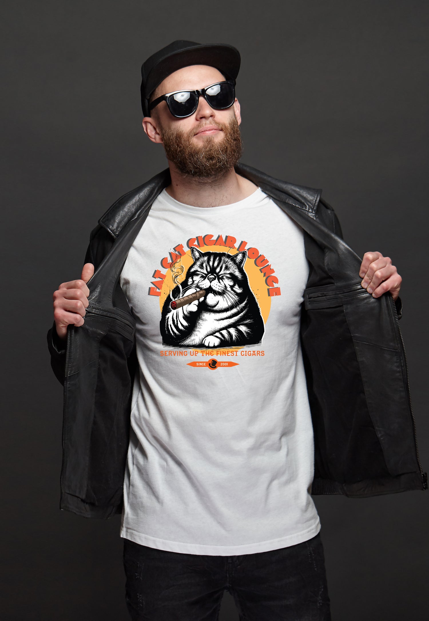 Guy wearing t-shirt with cigar store graphic.