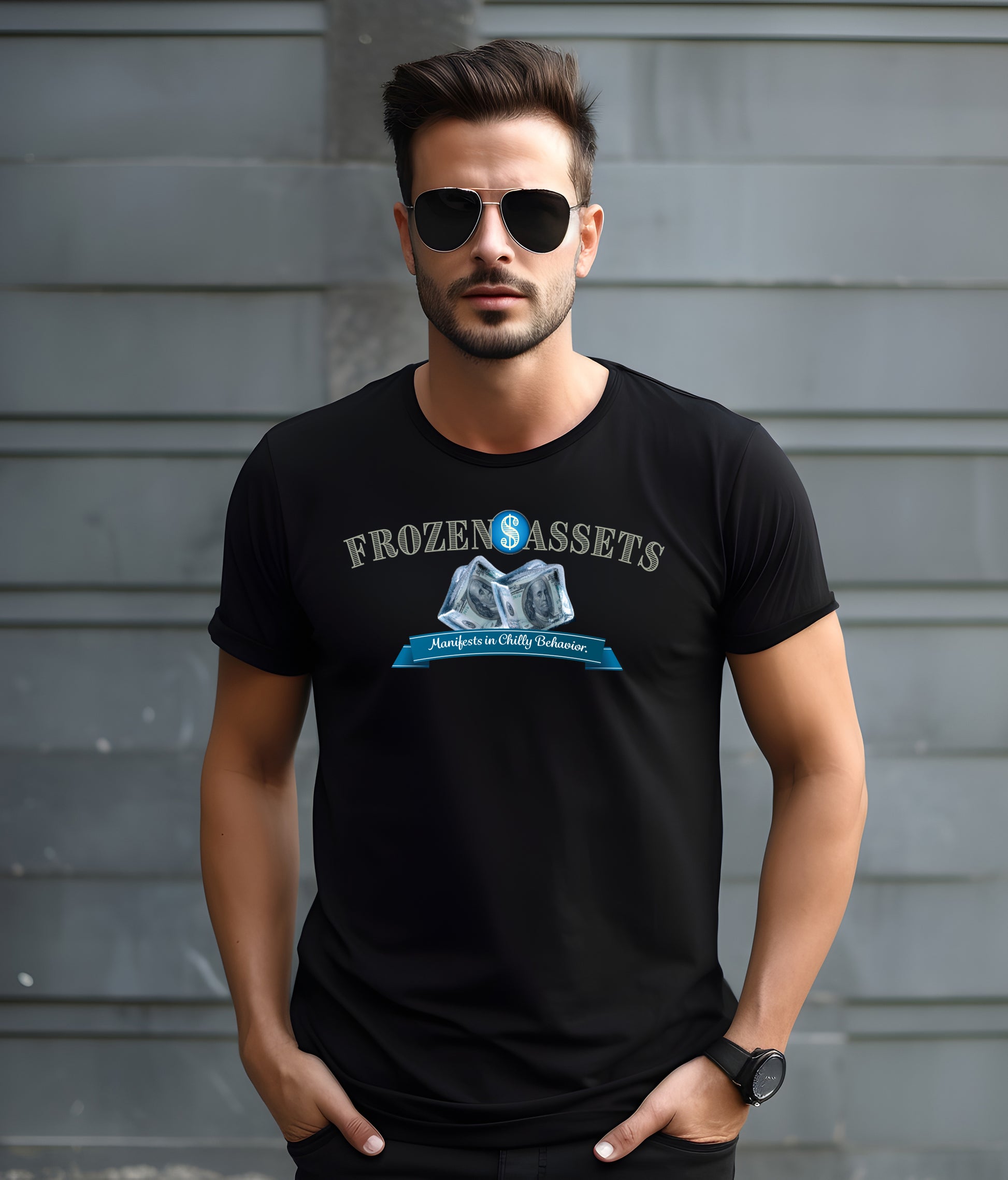 Man wearing a black t-shirt with 'Frozen Assets' graphic design against a gray background
wall.