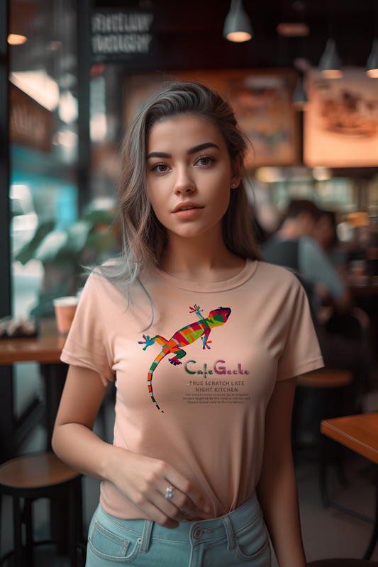 Woman wearing a t-shirt with a colorful Gecko design in a cafe setting