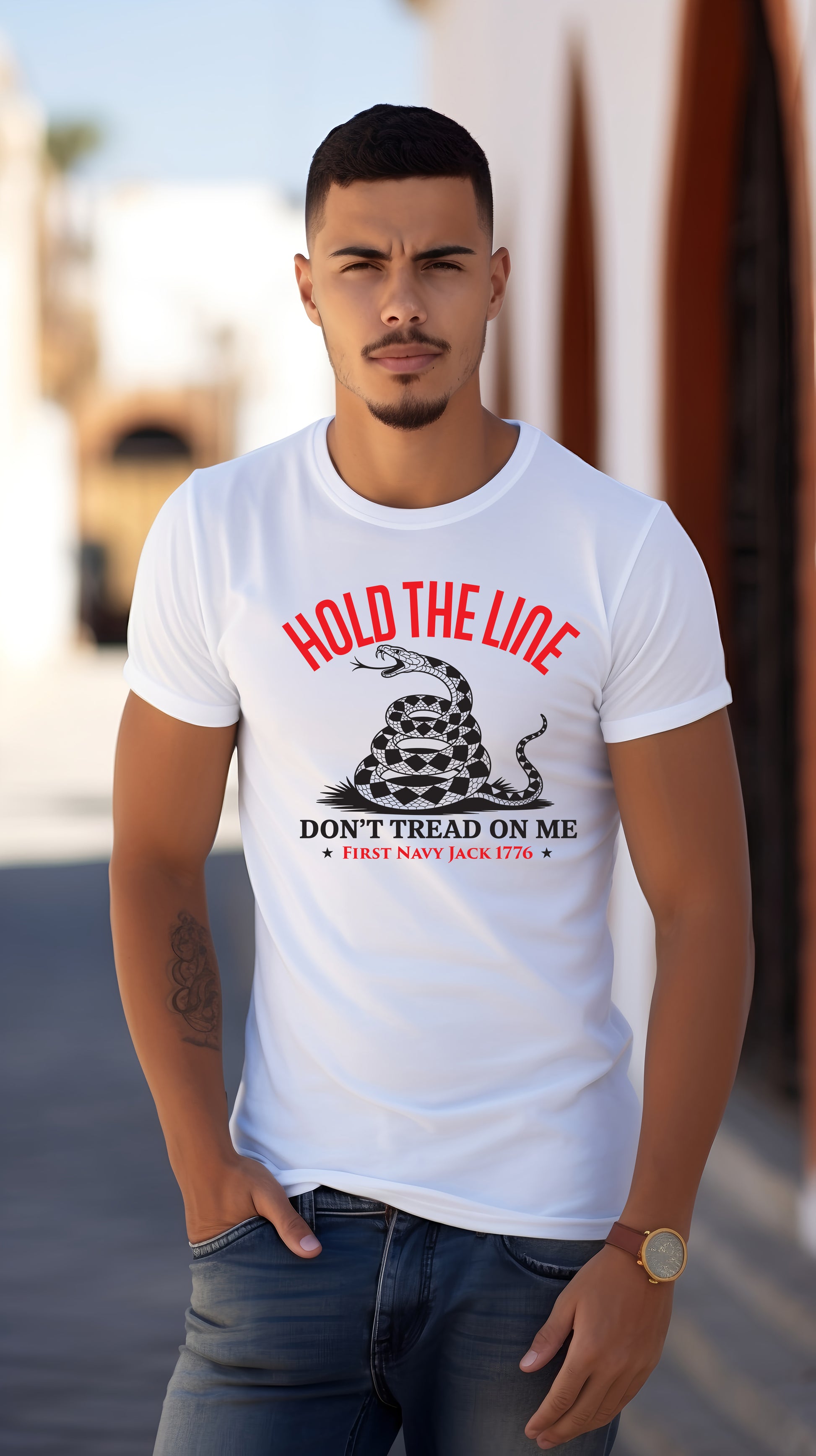 Man wearing a white t-shirt with "Don't Tread ON Me" graphic design and text.