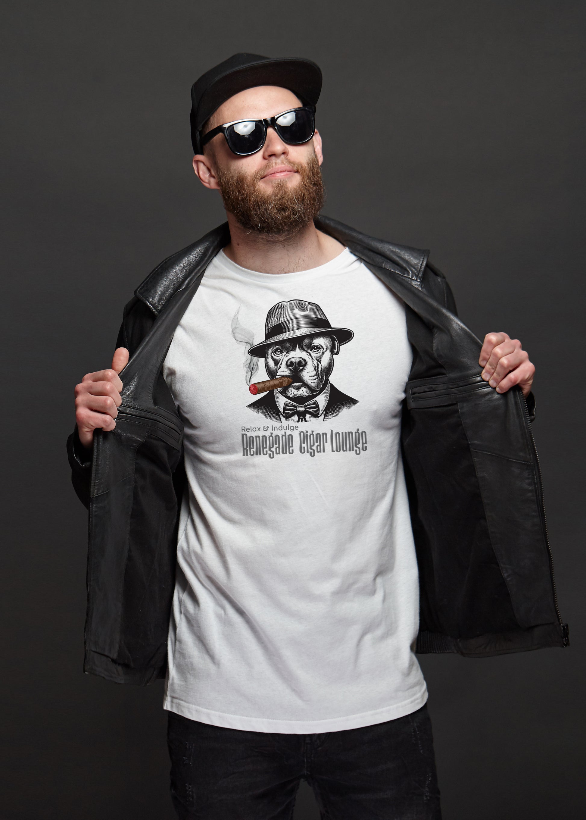 Man wearing a white t-shirt with a bull dog smoking a cigar graphic design and sunglasses, holding a black leather jacket.