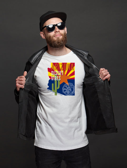 Man wearing a white t-shirt with a graphic design of an Arizona flag and 'Desert Vibes' text.
