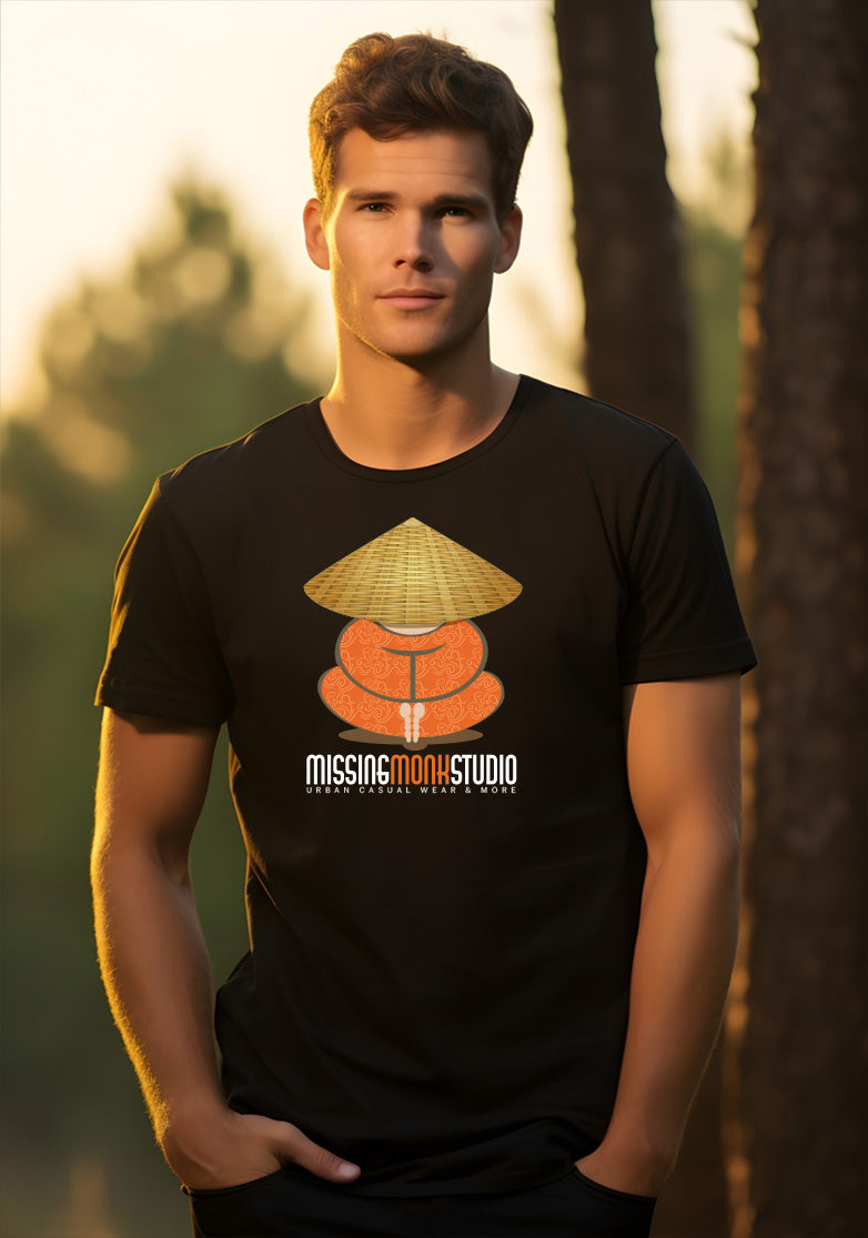 Man wearing a black t-shirt with a graphic design in a forest setting