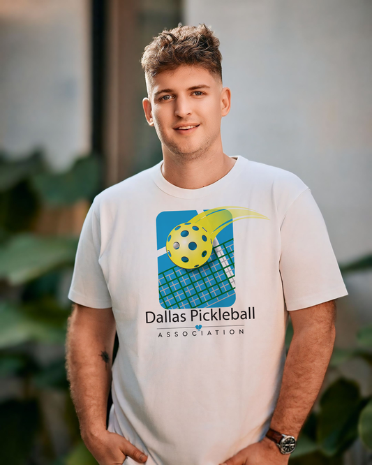 Person wearing a white t-shirt with a pickleball design and 'Dallas Pickleball Association' text.